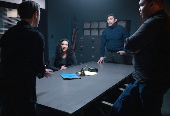 the crew discusses the case