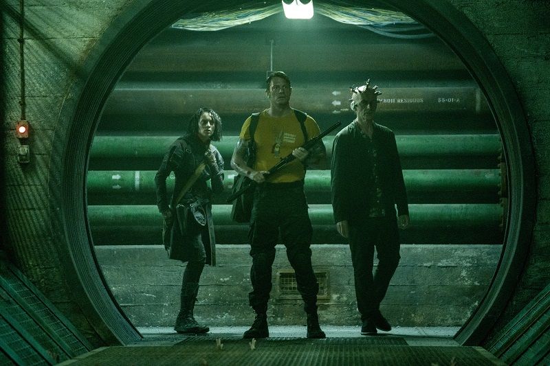 Still frame of Daniela Melchior, Joel Kinnaman, and Peter Capaldi