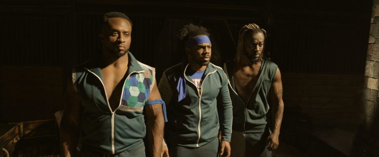 kofi, big e, and xavier woods in escape the undertaker