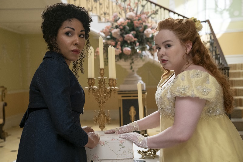 BRIDGERTON_206_Unit_02295R Kathryn Drysdale as Genevieve, Nicola Coughlan as Penelope Featherington in Bridgerton